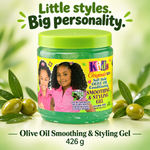 A jar of Kids Originals Soft Hold Olive Oil Conditioning SMOOTHING & STYLING GEL, featuring a bright green lid and a yellow label with pictures of two young girls. The jar is surrounded by green olives and leaves on a light green background with the text 'Little styles.