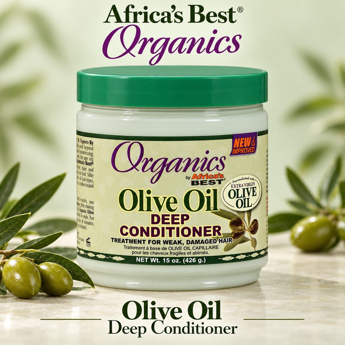 A jar of Africa's Best Organics Olive Oil Deep Conditioner with a green lid and cream-colored label, styled with olive branches and olives on a light marble surface with a soft-focus green background.