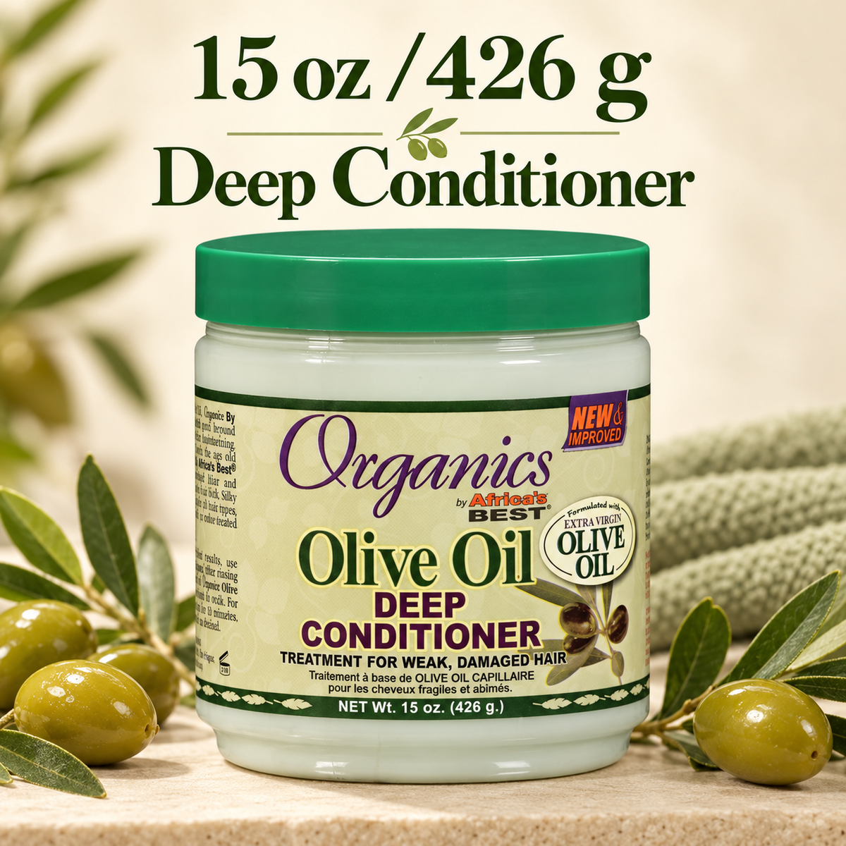 A jar of Organics by Atrium Best Olive Oil Deep Conditioner shown on a styled background with olive branches and olives. Large text at the top reads '15 oz / 426 g Deep Conditioner'.
