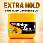 A jar of Shine 'n Jam Conditioning Gel Extra Hold, featuring a bright yellow-orange container with a black label, set against a warm beige background with large promotional text reading 'EXTRA HOLD' at the top.