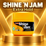 A jar of Shine 'n Jam Extra Hold Conditioning Gel centered on a gold pedestal with large 'SHINE 'N JAM Extra Hold' text above, in a glossy golden promotional graphic.