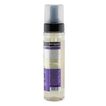 Foam bottle with purple label on a white background