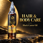 A bottle of STYLE Black Castor Hair Oil stands on a dark textured surface with a large blurred golden sphere in the background. The bottle is amber glass with a black and gold label and a clear dropper cap.