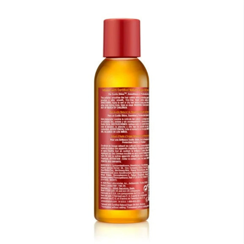 Skincare serum bottle with red cap and label on a white background