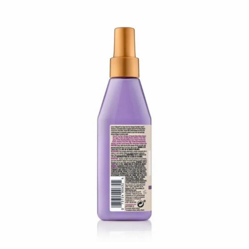 Purple spray bottle with gold nozzle on a white background