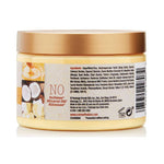 Jar with gold lid and white label on a white background