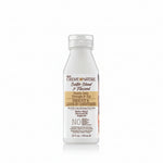 Creme of Nature hair care product bottle on a white background