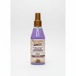 Bottle of Creme of Nature Pure Honey Damage Prevention Leave-In Treatment on a white background
