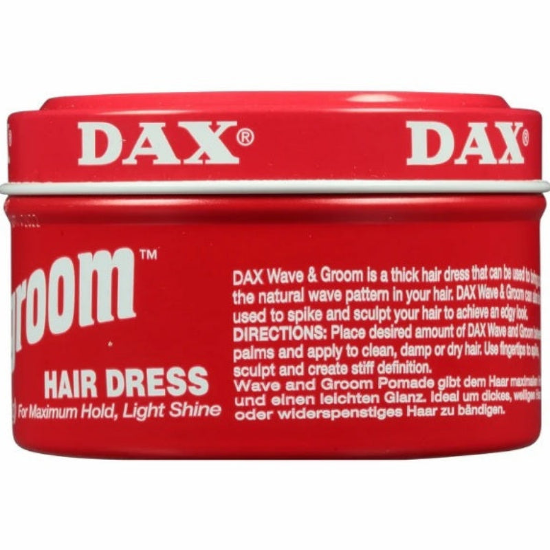 Red container of DAX hair dress with white text on a white background