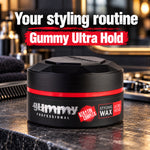 A black jar of Gummy Professional Gummy Ultra Hold Keratin Complex Styling Wax sits on a dark granite countertop with a blurred kitchen or bar background. Bold white and red text at the top reads 'Your styling routine Gummy Ultra Hold'.