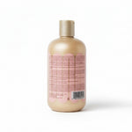Beige bottle with a label on a white background
