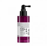 Purple bottle with black pump on a white background