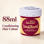 A jar of La Tiche Directions Conditioning Hair Colour shown on a warm cream background with text reading '88ml Conditioning Hair Colour'. The product is a semi-permanent hair color in a clear jar showing deep burgundy hair dye, with a yellow and burgundy label and a white lid.