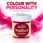 A jar of La Richie Directions semi-permanent conditioning hair colour in the shade Flamingo Pink, set against a white background with vibrant pink hair strands flowing behind it and promotional text at the top.