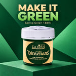 A jar of La Richie Directions Semi-Permanent Conditioning Hair Colour in 'Spring Green' is displayed on a green geometric pedestal with promotional text reading 'MAKE IT GREEN' in the background.