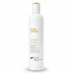 Milk Shake Argan Shampoo bottle on a white background