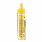 Foam bottle with yellow cap on a white background