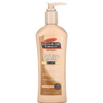A pump bottle of Palmer's Cocoa Butter Natural Bronze Tan Lotion with the text 'Cocoa Butter Formula' and 'Natural Bronze' prominently displayed, indicating the brand and product line.
