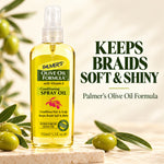 A bottle of Palmer's Olive Oil Formula Conditioning Spray Oil with Vitamin E, shown on a light beige background with olive branches and text reading 'KEEPS BRAIDS SOFT & SHINY'.