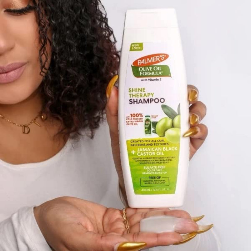 Close-up of Palmer's Olive Oil Smoothing Shampoo with ingredients