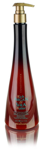 Red conditioner bottle with pump and visible label on a white background