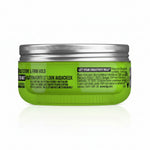 Green hair product jar with silver lid on a white background