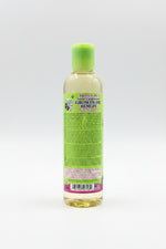 Bottle of 'Protein Plus' natural conditioning growth oil remedy with a green label on a white background.