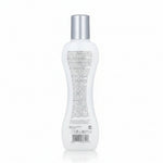 White bottle with silver cap on a white background