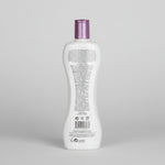 Bottle with a purple cap on a white background