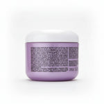 Purple hair mask jar with white lid on a white background