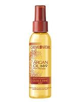 Creme of Nature Argan Oil spray bottle on a white background