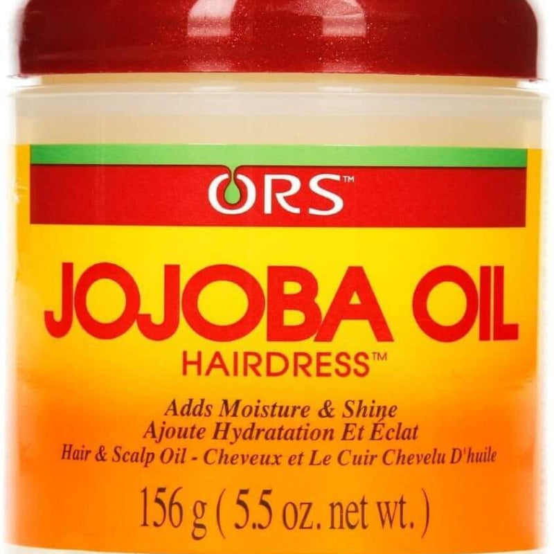 Jar of ORS Jojoba Oil Hairdress with red lid and orange label.